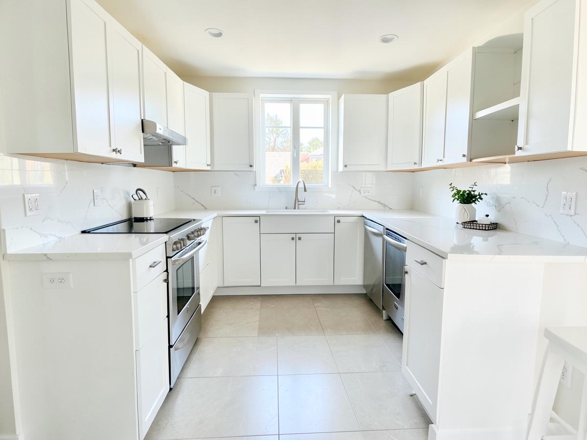 Modern remodeled kitchen with new cabinets and countertops